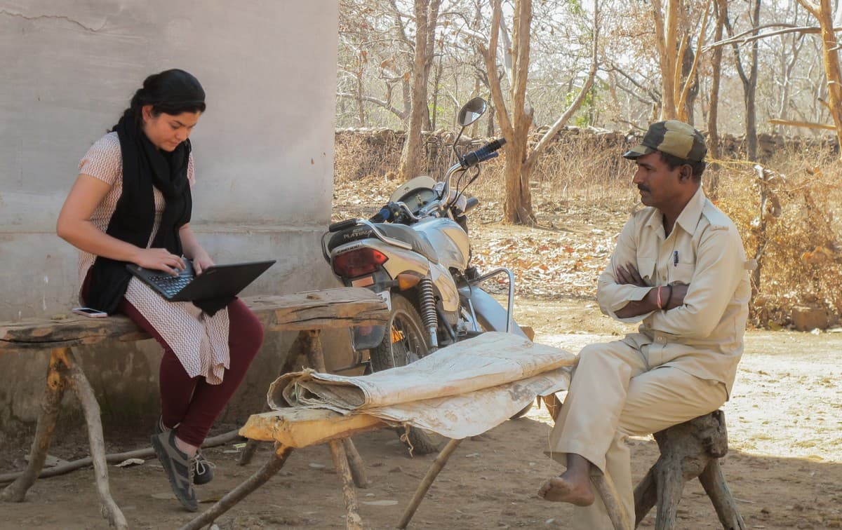 WCT’s conservation psychologist interviewing a forest guard in Panna Tiger Reserve, Madhya Pradesh.